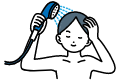 ぬるま湯で頭皮をマッサージしながら汚れを落とす
